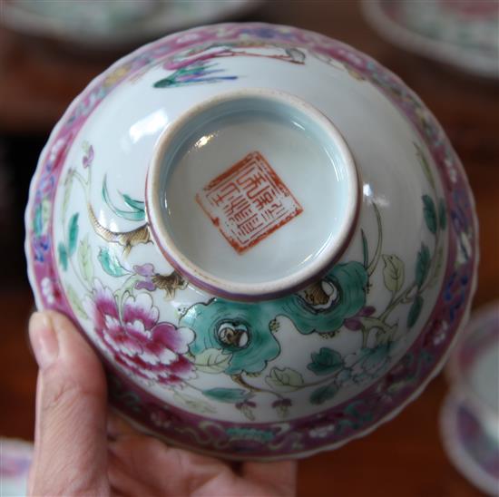 A group of Chinese Straits famille rose phoenix and peony bowls and plates, c.1900, (18)
